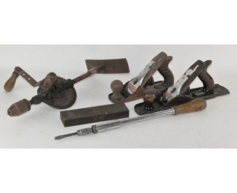 A selection of various tools, to include a Stanley Bailey plane, drill and more