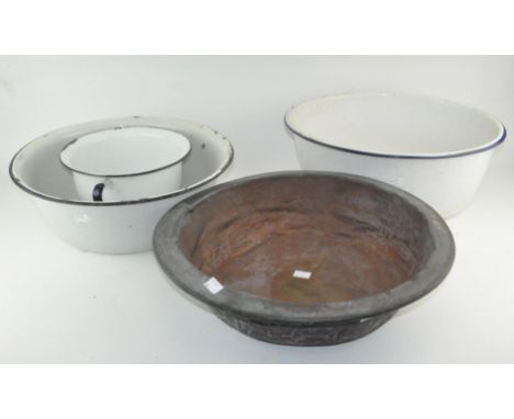 An enamel chamber pot together with two large enamel basins and a metal example, the largest 41cm diameter
