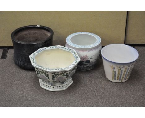 A group of four modern ceramic jardinieres, each of different designs, largest 29cm x 30cm