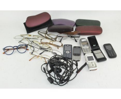 Six vintage mobile phones, Nokia, Motorola, Samsung, LG and eleven pairs of spectacles