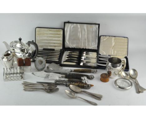 A collection of silver plated wares, including a hip flask, toast rack, teapots and other items