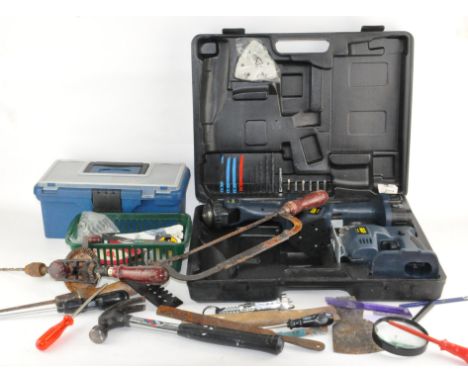 A collection of tools, to include a Metabo hand drill, hammer and more