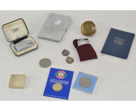 Assorted items, including two silver medallions, tow Ronson lighters, a pocket watch and more