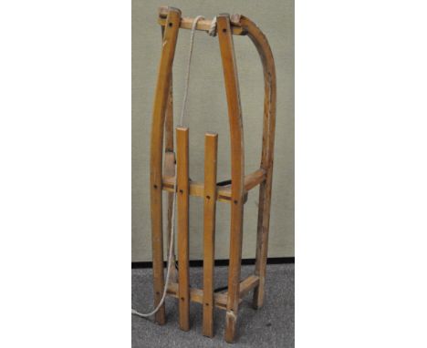 A vintage wooden sled, 109cm long