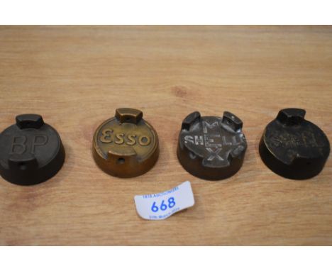 Four vintage petrol can caps BP, Esso, Shell Mex, and Shell