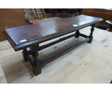 A miniature oak bench 