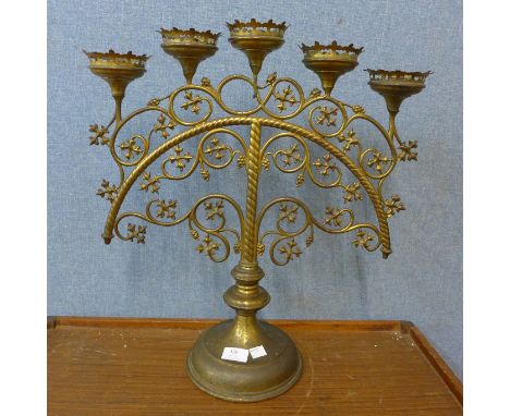 A late 19th Century French ecclesiastical brass candelabra 