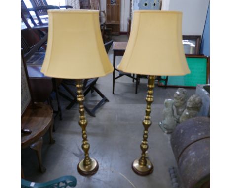 A pair of vintage eastern brass floor standing lamps 