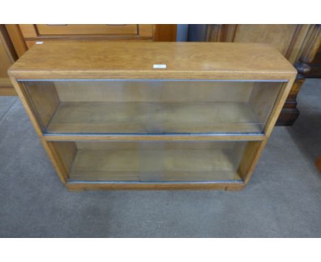 A Minty light oak two tier bookcase 