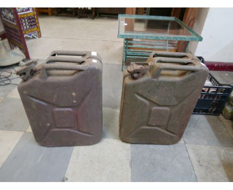 Two vintage military issue Jerry cans, both dated 1945 