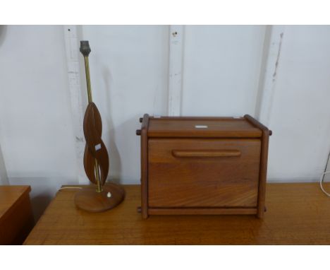 A Danish teak table lamp and a box 