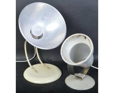 Two retro vintage 20th century converted heat table lamps having metal shades. The lot to include a dome shaped heat table la