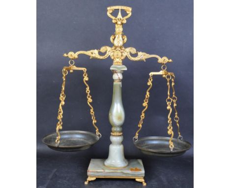 A retro vintage mid 20th Century large onyx weighing scales. Having gilt and brass decoration, with supported arm and chain s