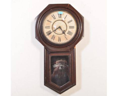 A 19th century drop dial postal / railway wall clock having an octagonal wooden frame with Roman numerals to chapter ring. Th