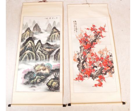 Two vintage 20th century Chinese Oriental ink scrolls having an ink calligraphic script featuring a mountainous landscape wit