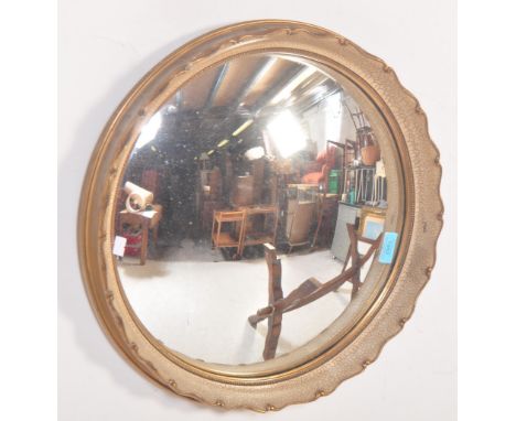 A vintage 20th century circa. 1940's wall fish eye - convex&nbsp; mirror of circular form having pie crust type edge with cra