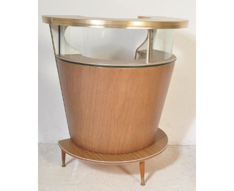 A retro vintage mid 20th Century cocktail barrel bar cabinet. Of half circular form with flared top glass top top and teak ve