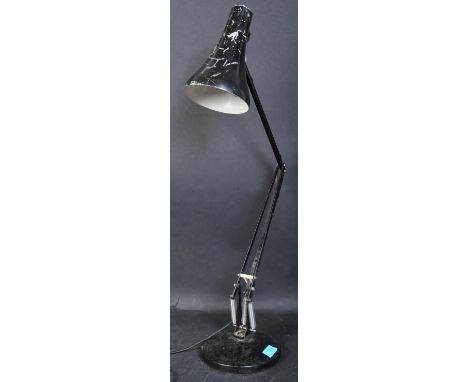 A vintage retro 20th century black Anglepoise&nbsp; Model 90 table desk lamp having conical shade over articulated arm on a c