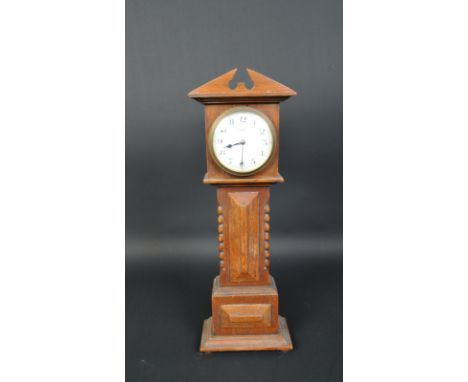 J. Vincent of Weymouth - An early 20th century miniature apprentice longcase clock. The clock having an enamelled face with A