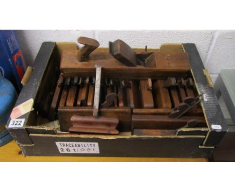 Box of vintage wood working planes