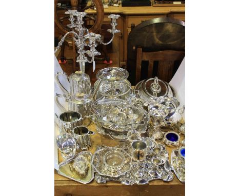 Good collection of silver plated ware including candelabrum, tureen, four-piece tea service, pair of silver dishes, etc