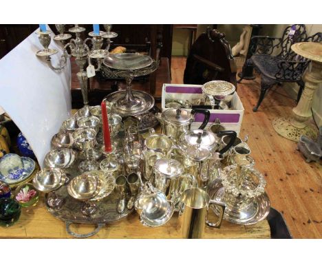 Large collection of silver plated ware including candelabrum, tea service, cakestands, flatware, etc