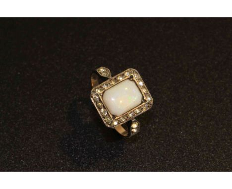 9 carat gold, silver and opal ring