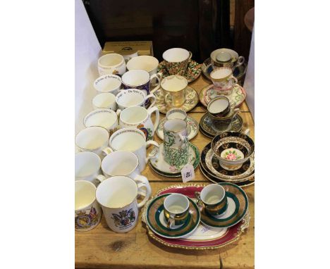 Collection of cabinet cups and saucers and commemorative mugs