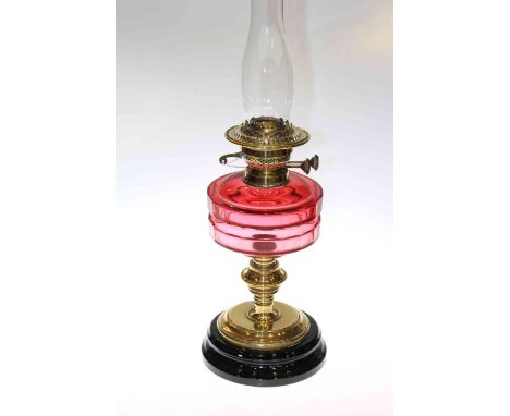 Victorian brass oil lamp with ruby reservoir