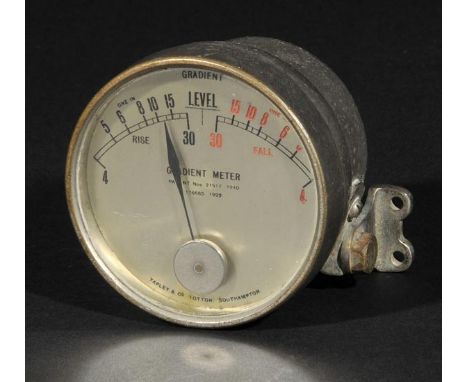 A 1920s Gradient Meter by Tapley &amp; Co Totton Southampton, with gilt metal circular dial, scale for rise and fall and Pate