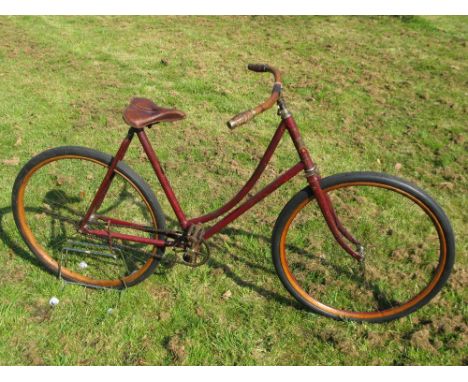 *A 'Reliance' Ladies Loop Frame Bicycle. A 'Model D' from the Ohio Manufacturer circa 1900 with a 22-inch frame,  open top fo