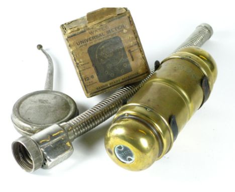 *A Lucas 17c spare bulb-holder. A brass cylinder with caps at both ends, with its firewall mounting clip,  also a Lucas No 20