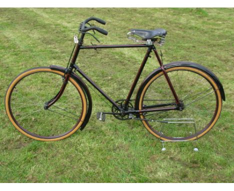 *A 1925 Humber Co. Ltd., gentleman's 'Olympia' roadster. Restored in 2000,  the remains of the finish allowed the correct red