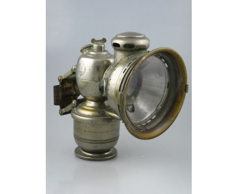 *A 'Lustra' acetylene-gas-powered bicycle lamp by Joseph Lucas,  in good condition with its original nickel-plating, dated 19