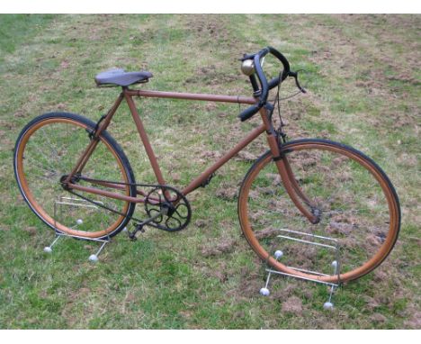 *An Anzile of Marseille gentleman's light roadster with a brown-painted 22-inch frame,  26-inch tangent spoked wooden wheels,