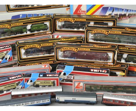 *Model Rail. A collection of model rail comprising 28 boxed Lima Models,  including coaches and rolling stock plus two large 