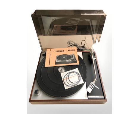 A Thorens TD-150 turntable, with Shure M75ED Type 2 stylus, manual and leads. (as found) CONDITION REPORT: Perspex top damage