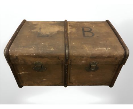 An antique canvas bound luggage trunk, width 90 cm.
