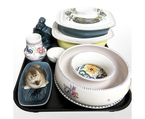A collection of Poole pottery to include vase, fruit bowl, pair of figures of sea lions, figure of a duck, two lidded tureens
