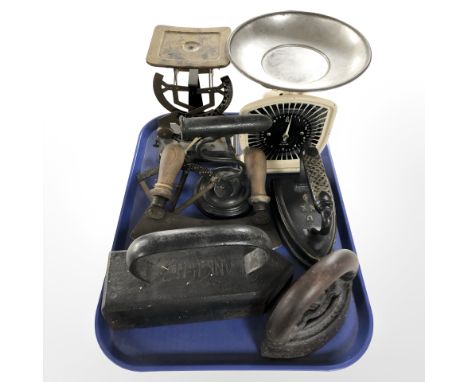 A group of vintage scales, irons, antique kitchen knife, etc.