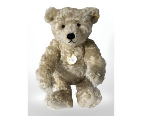 A Steiff jointed teddy bear with growler, length 34 cm.