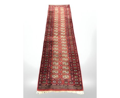 A Turkoman runner, Afghanistan, 281 cm x 81 cm.