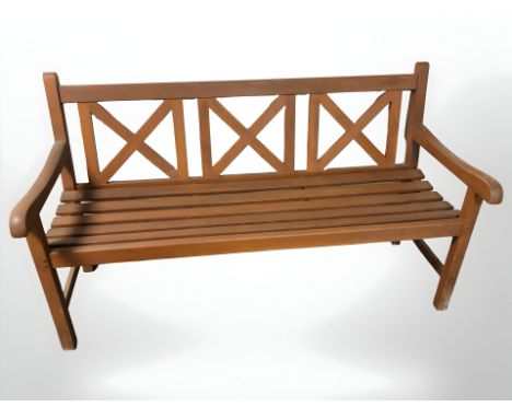 A stained teak garden bench, 152 cm x 66 cm x 87 cm.