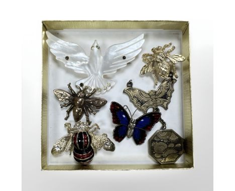 A group of brooches, insects, mother of pearl dove, enamel bumble bee etc 