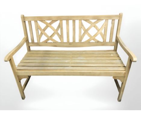 A teak garden bench, 120 cm x 60 cm x 91 cm.