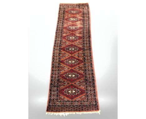 A Lahore Bokhara runner, Pakistan, 200 cm x 62 cm.