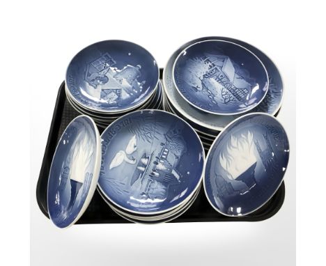 Twenty three Bing & Grondahl blue and white porcelain collectors plates.