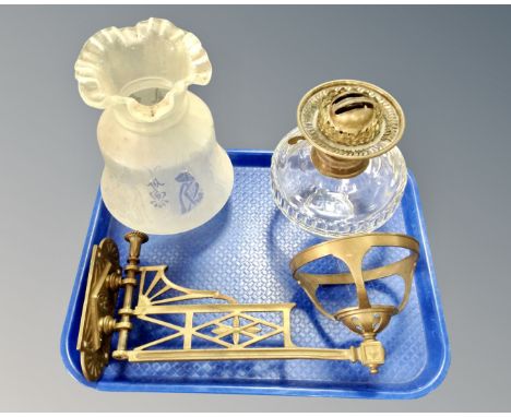 A late Victorian brass hanging oil lamp with etched and clouded glass shade.