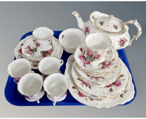 A tray of Hammersley rose pattern tea china.