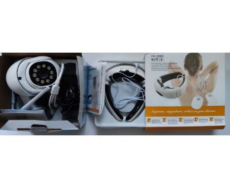 Boxed outdoor security camera, back massager, bbq/kitchen tools, and a typewriter.